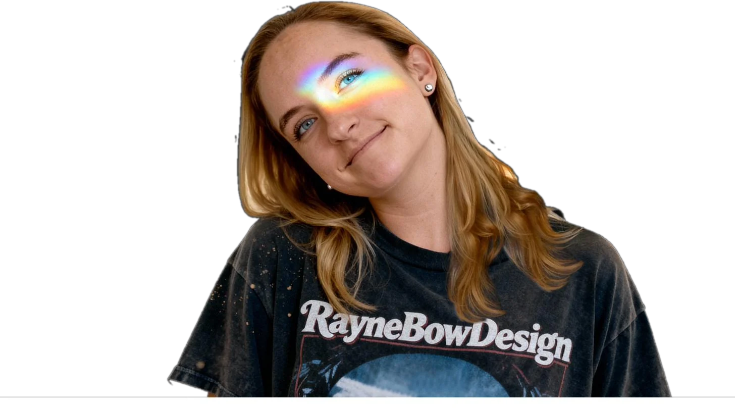 Rayne Scheepers wearing a RayneBowDesign tee, with a rainbow light strip across her eyes